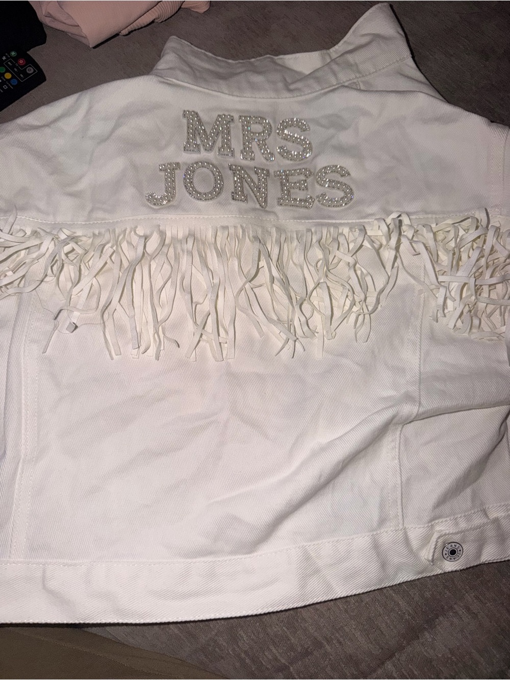 White Fringe Denim Jacket with Embellished 'MRS JONES' Detail